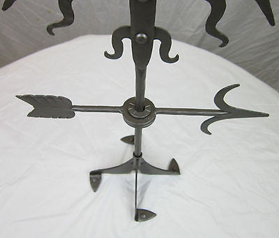 Spanish style hammered wrought iron cross weathervane sculpture - Bushere & Son Iron Studio Inc.
